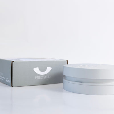 White smoke alarm and box with 'PRECISION' branding on a white background