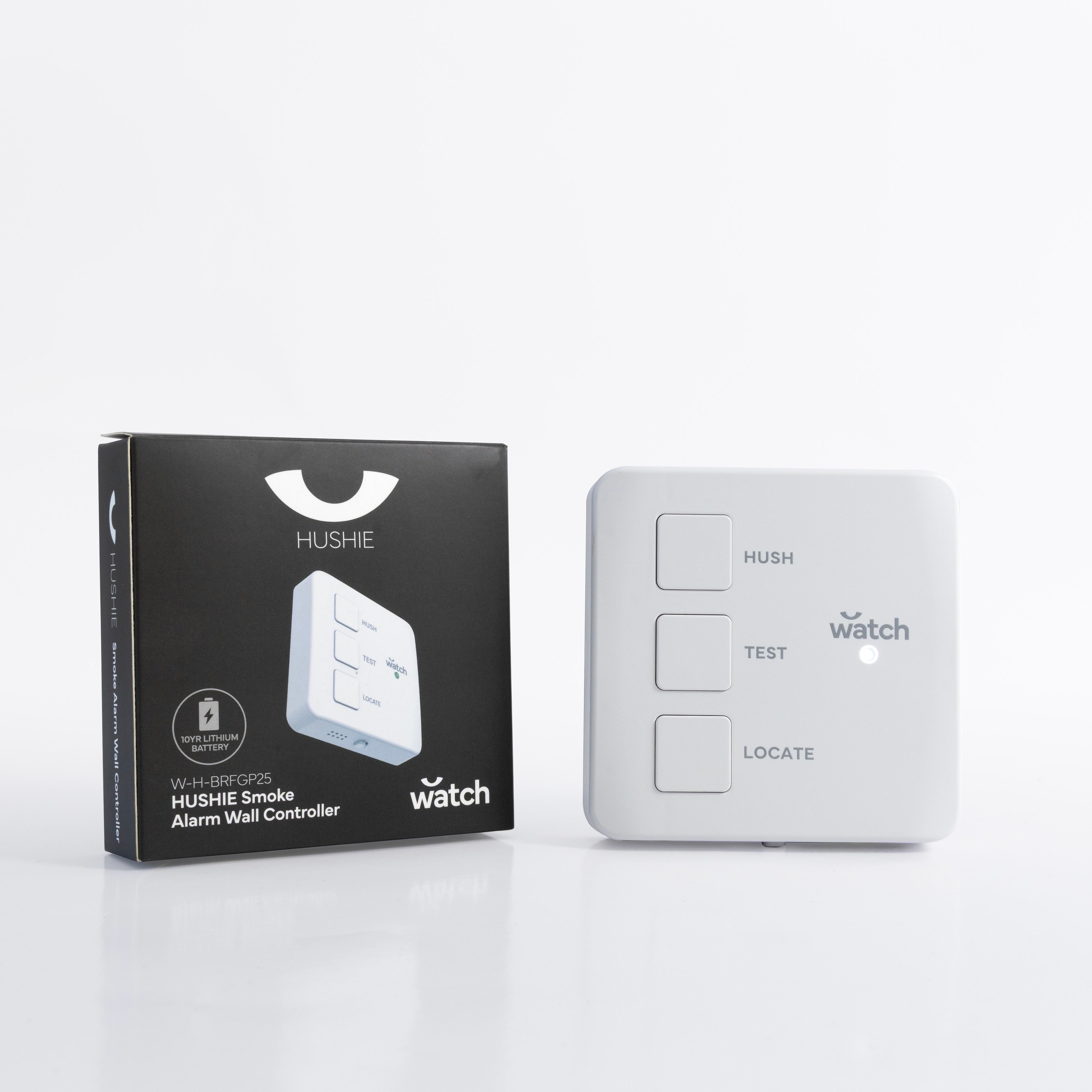 Smoke alarm wall controller with packaging on a white background